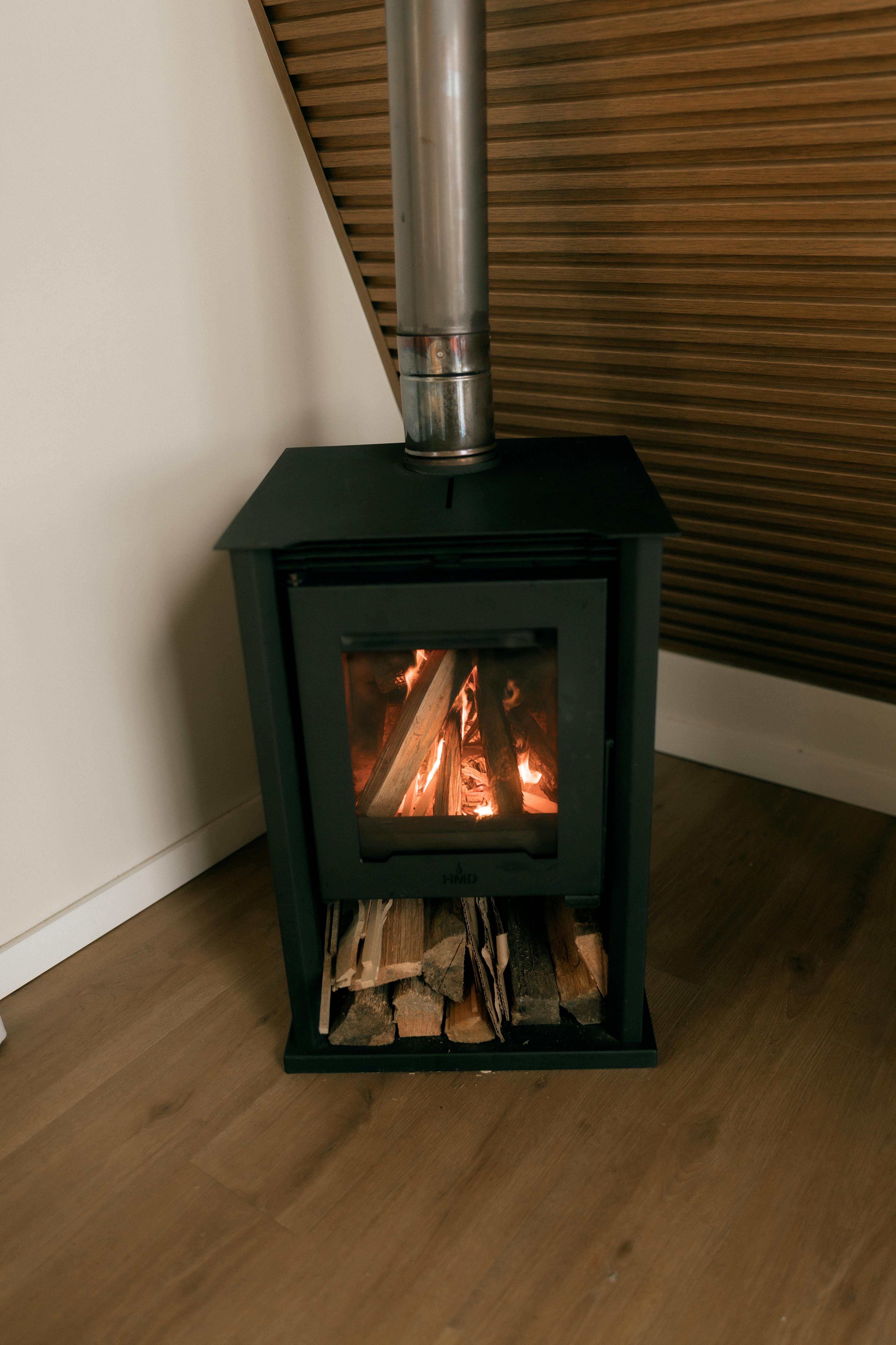 Wood burner and fireplace prepared for chimney sweeping support.
