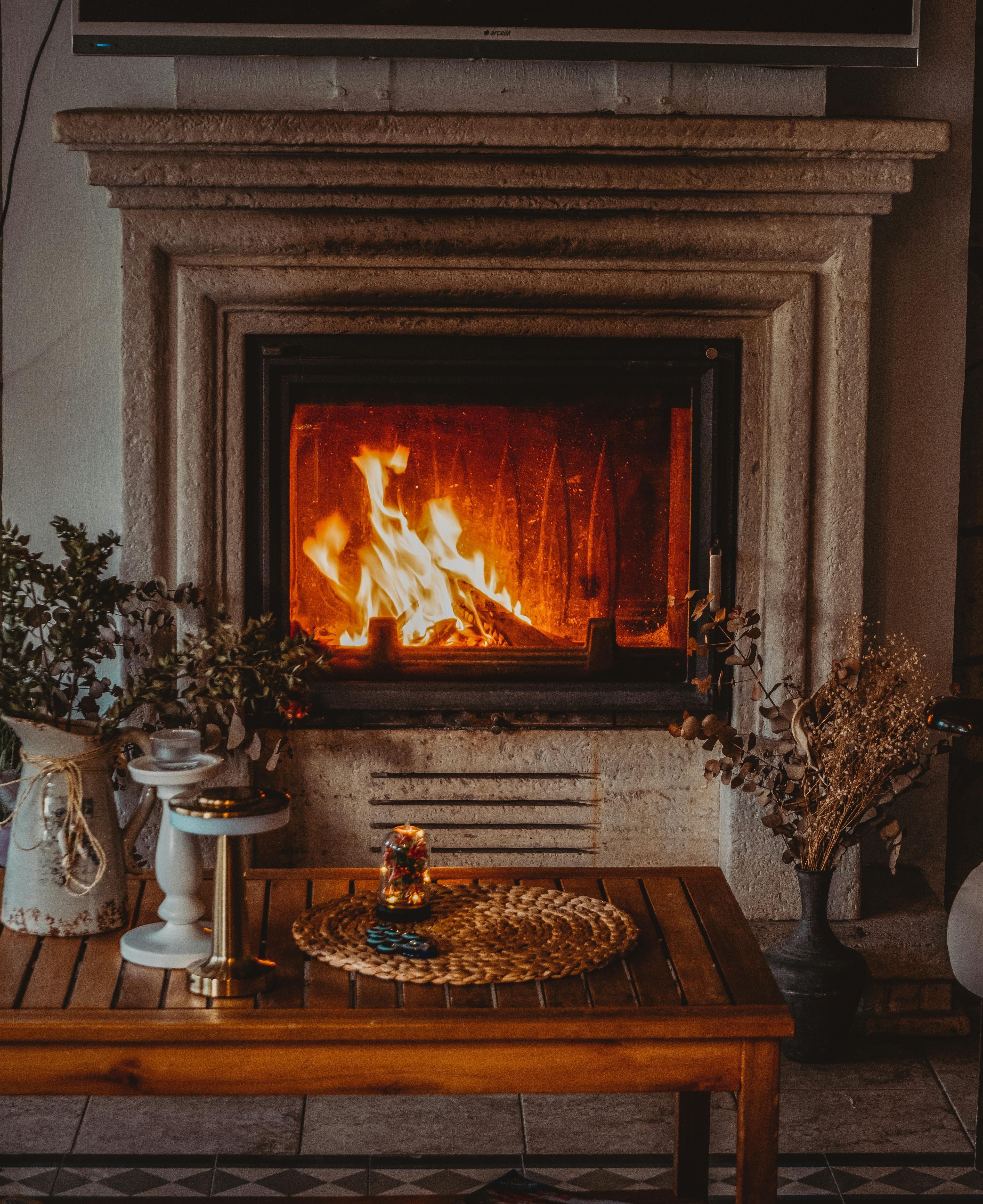 a cosy fireplace in a rural cottage